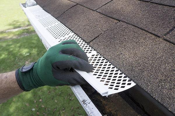 gutter guards can enhance the aesthetic appeal of your home by keeping the gutters clean and free of debris